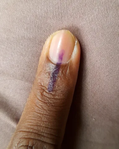 Representative photo: a finger with the voting ink mark