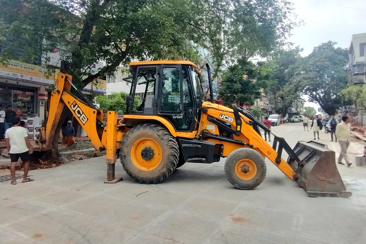 Representative photo: a JCB machine at work by a road