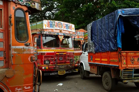Trucks parked along a road (representative)