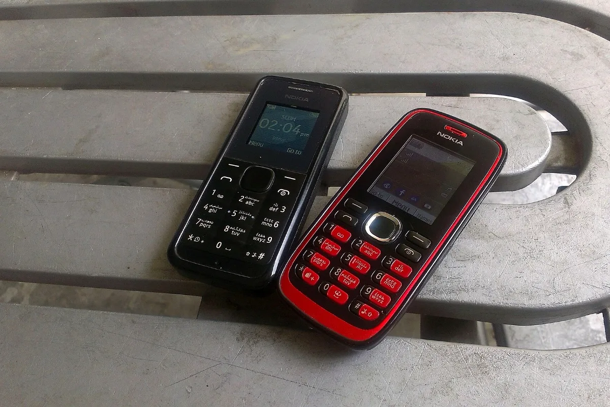 Two keypad mobile phones (representative)
