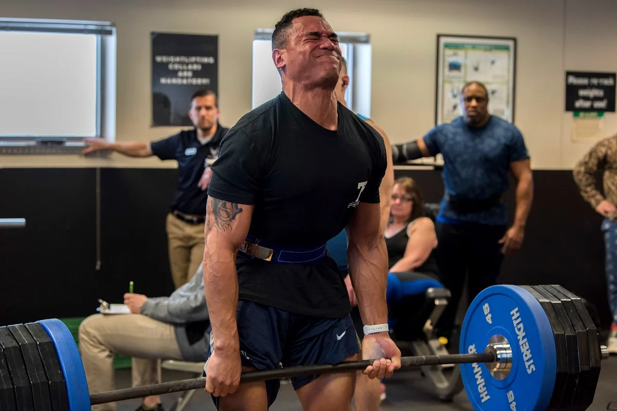 A lifter performing a deadlift at a powerlifting competition (representative)